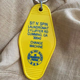 Motel Key Fobs, Sit n' Spin Laundromat