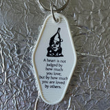 Motel Key Fobs, Tin Man, Wizard of Oz, A heart is not judged by how much you love, but by how much you are loved by others.
